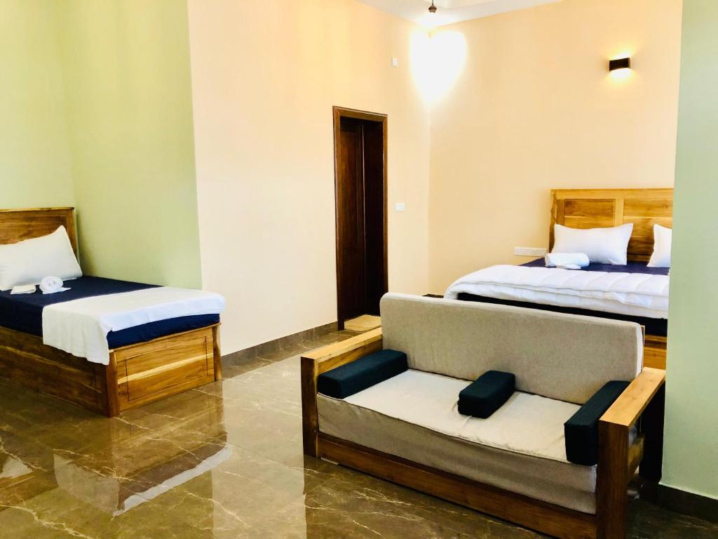 Postel nebo postele na pokoji v ubytování Sound Sleep Resort