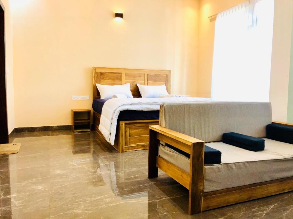 Postel nebo postele na pokoji v ubytování Sound Sleep Resort