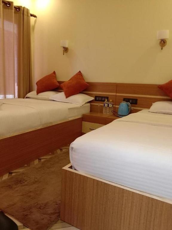 Postel nebo postele na pokoji v ubytování Freedom Resort