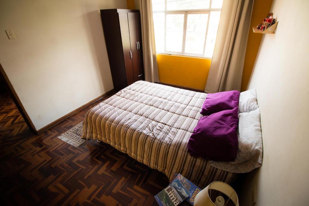 Postel nebo postele na pokoji v ubytování Casa de Viajeros