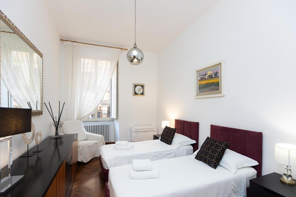 A bed or beds in a room at TIME