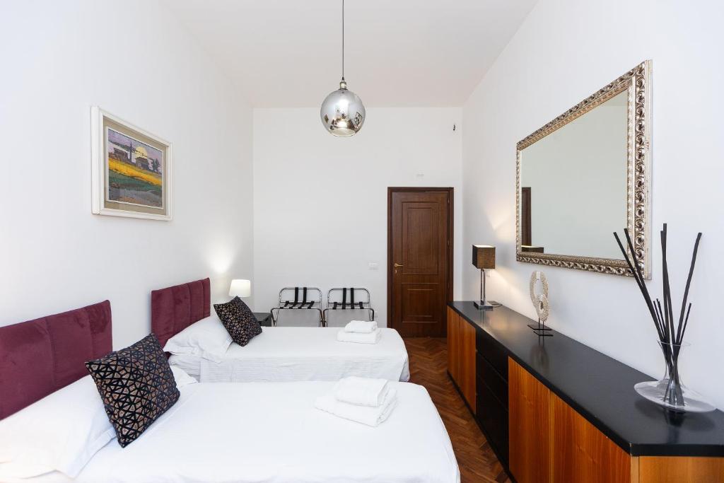 A bed or beds in a room at TIME