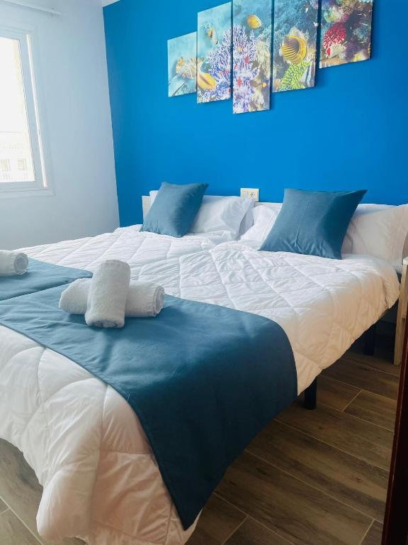 Postel nebo postele na pokoji v ubytování Europa Family Apartments