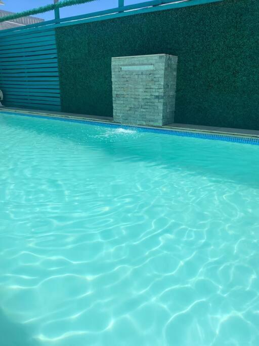 Bazén v ubytování Charming and Family With a pool and ocean view, 3 blocks from the beach, with 2 TVs and Netflix nebo v jeho okolí