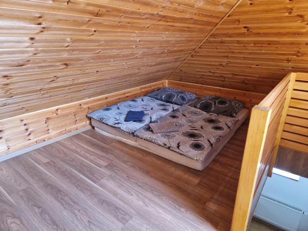 Postel nebo postele na pokoji v ubytování Apartmány Na rychtě