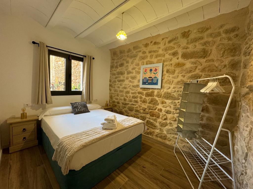 Postel nebo postele na pokoji v ubytování Casa Don Pelayo Boutique Apartments & Café