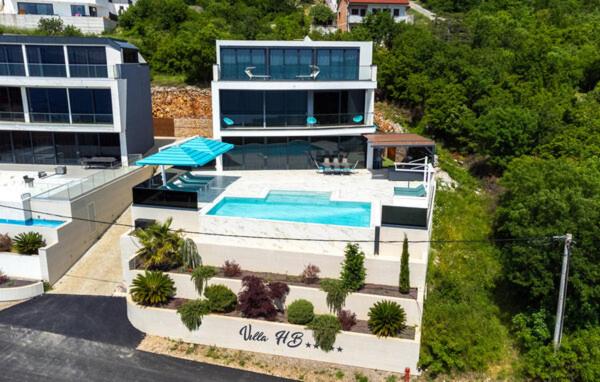 an aerial view of a house with a swimming pool at Villa HB Crikvenica in Crikvenica