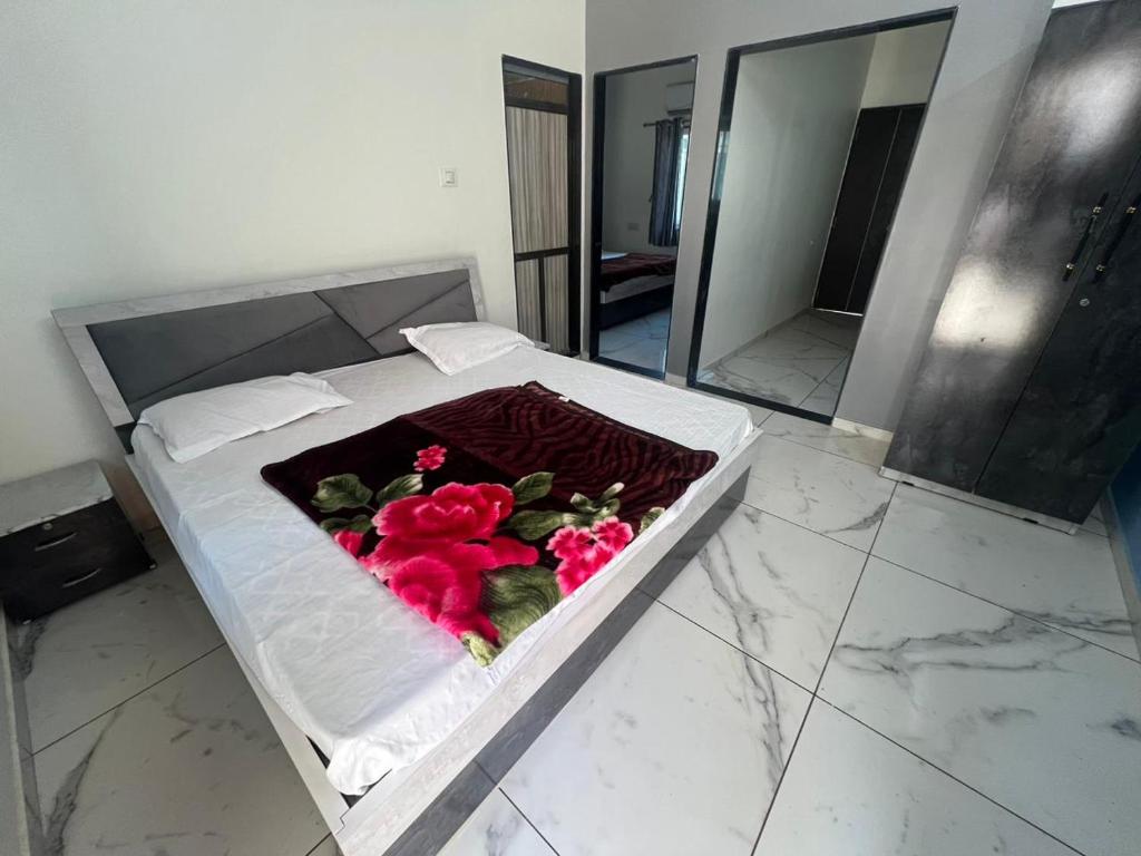 Katil atau katil-katil dalam bilik di Rudraksh Homestay