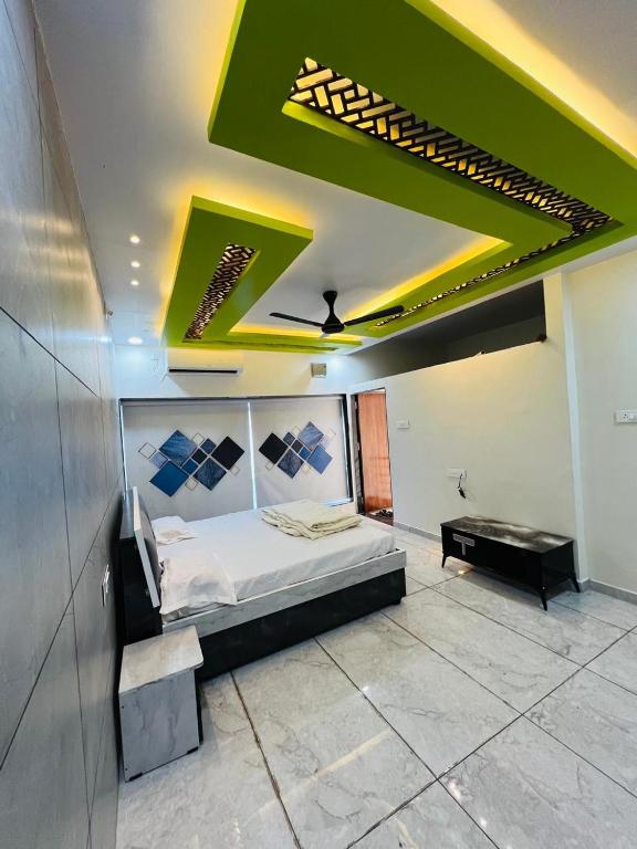 Katil atau katil-katil dalam bilik di Rudraksh Homestay