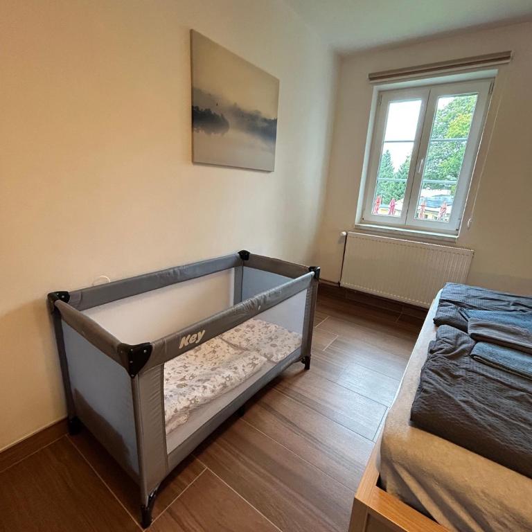 Łóżko lub łóżka w pokoju w obiekcie Apartmán 430