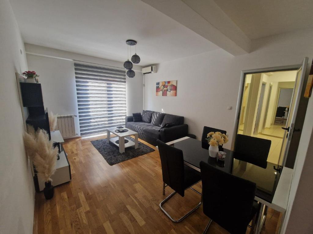 Posezení v ubytování Apartman Tri S