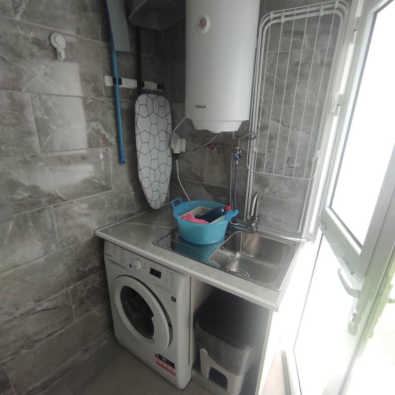 Kuchyň nebo kuchyňský kout v ubytování Apartamentos y Lofts Makana
