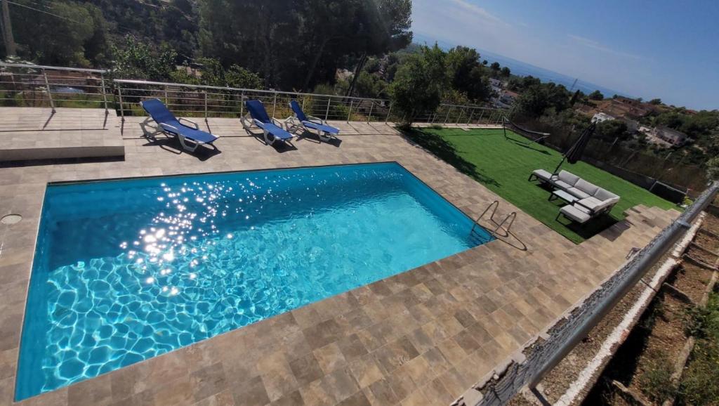 Bazén v ubytování Maison de Rêve avec Piscine Privative et Vue sur Mer - Proche Barcelone et Port Aventura nebo v jeho okolí