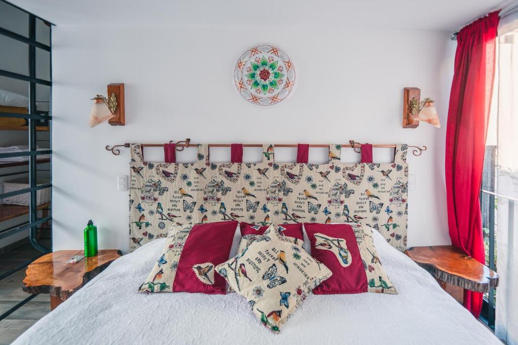 Postel nebo postele na pokoji v ubytování AYCA La Flora Hotel Boutique