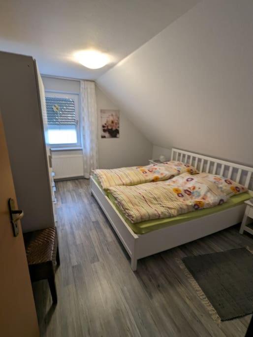 Postel nebo postele na pokoji v ubytování Moin MML