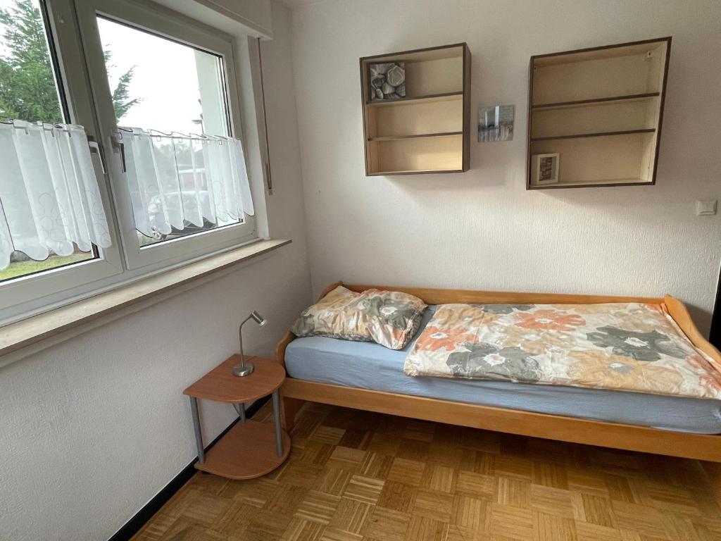 Postel nebo postele na pokoji v ubytování Linnemanns Gaestehaus