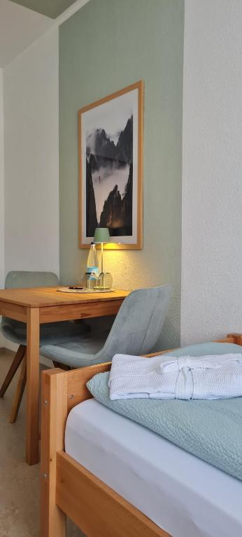 Postel nebo postele na pokoji v ubytování Pension Schul Inn