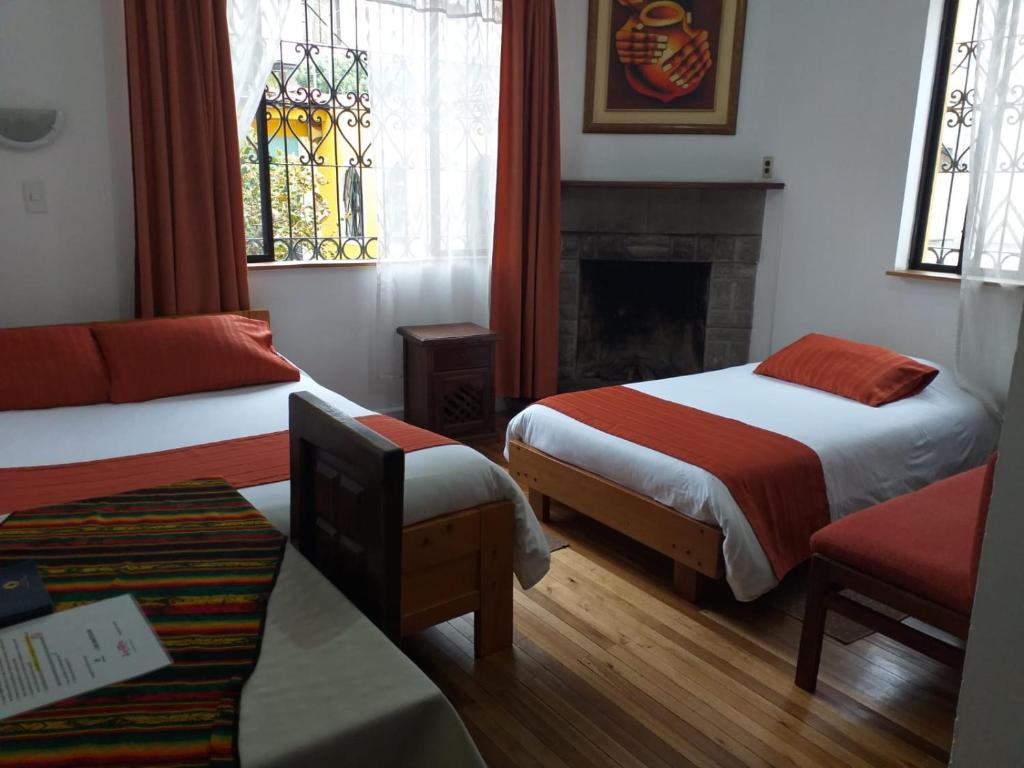 Postel nebo postele na pokoji v ubytování Hotel Andino