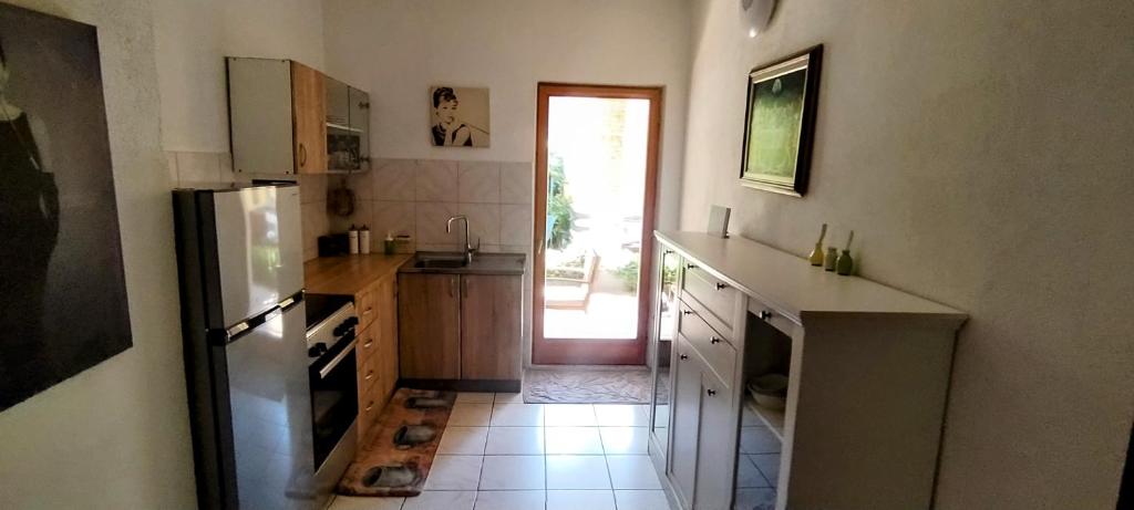 Kuchyň nebo kuchyňský kout v ubytování Holiday Home Kotulin