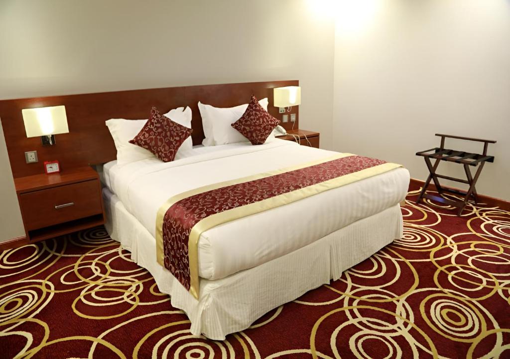 Postel nebo postele na pokoji v ubytování Wow Hotel Jeddah