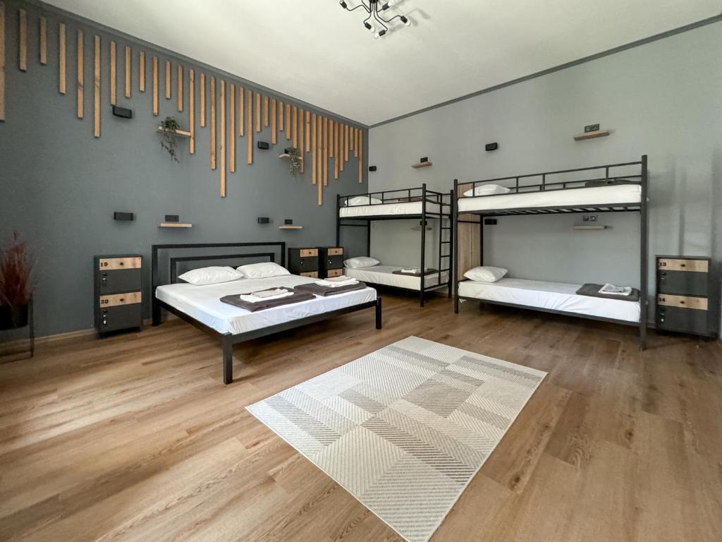 Postel nebo postele na pokoji v ubytování Apartments White Pearl Sadova