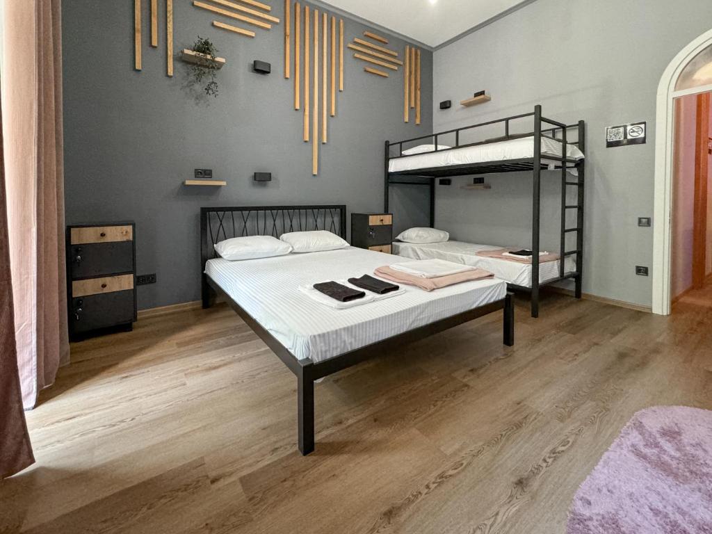 Postel nebo postele na pokoji v ubytování Apartments White Pearl Sadova