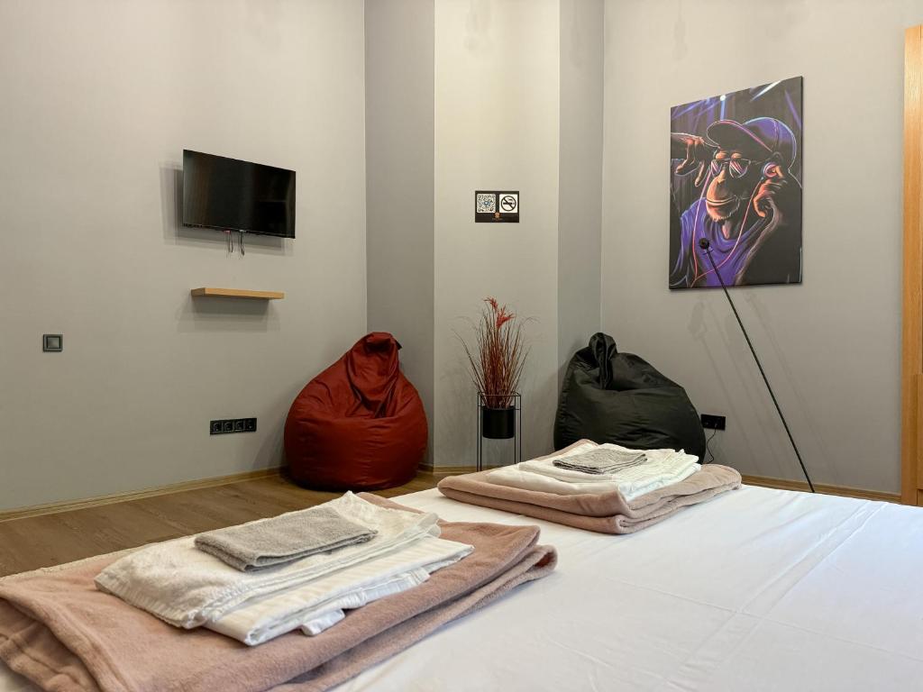 Postel nebo postele na pokoji v ubytování Apartments White Pearl Sadova