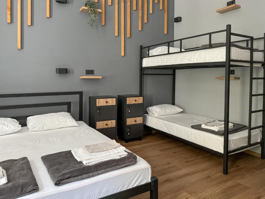 Postel nebo postele na pokoji v ubytování Apartments White Pearl Sadova