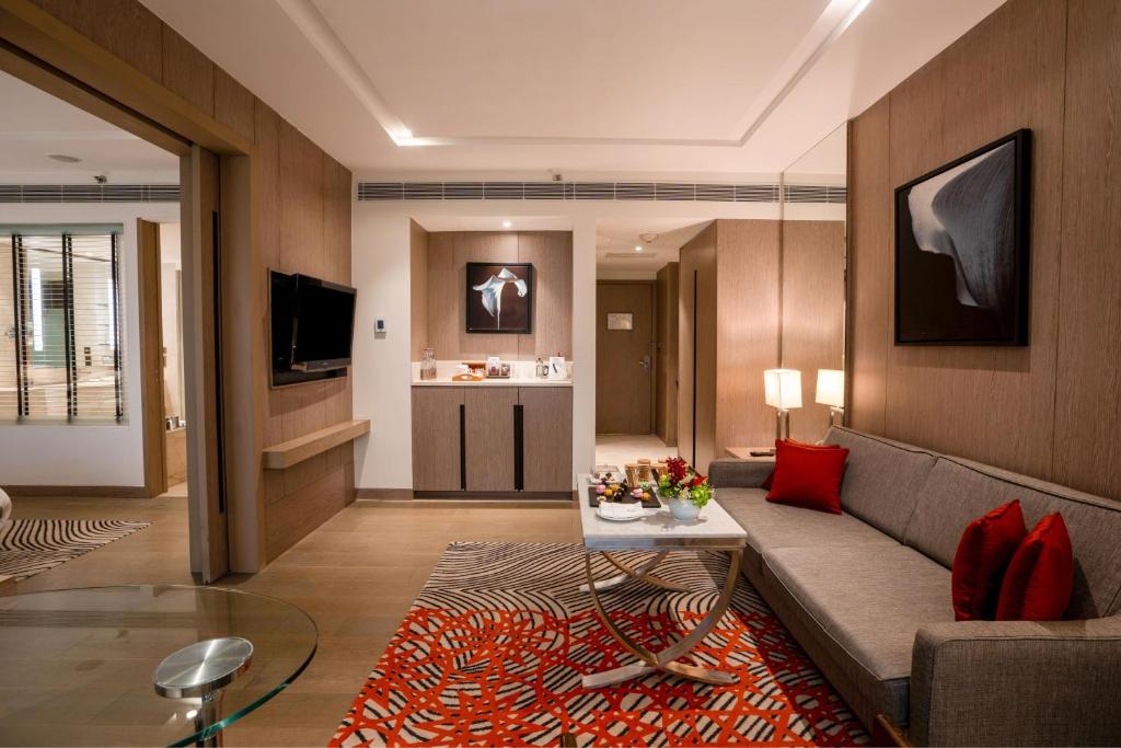 TV a/nebo společenská místnost v ubytování Sheraton New Delhi Hotel