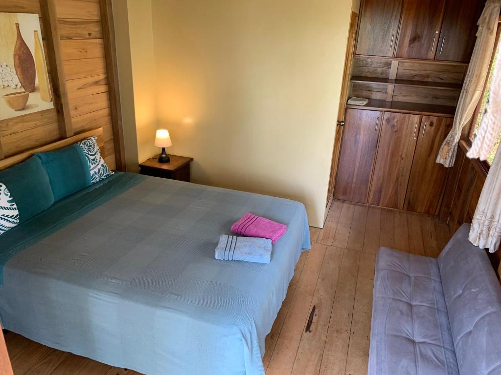 Postel nebo postele na pokoji v ubytování L'Oasis Don Juan