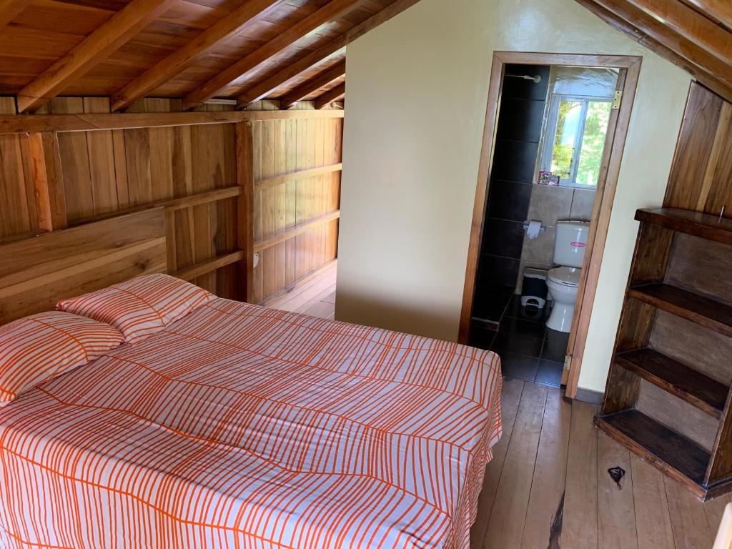 Postel nebo postele na pokoji v ubytování L'Oasis Don Juan