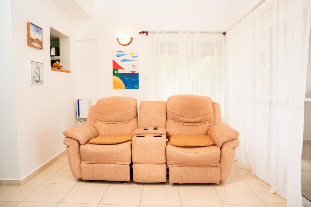 Posezení v ubytování Apartamento Los Anturios en Puerto Plata Bayardo