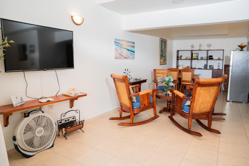 TV a/nebo společenská místnost v ubytování Apartamento Los Anturios en Puerto Plata Bayardo