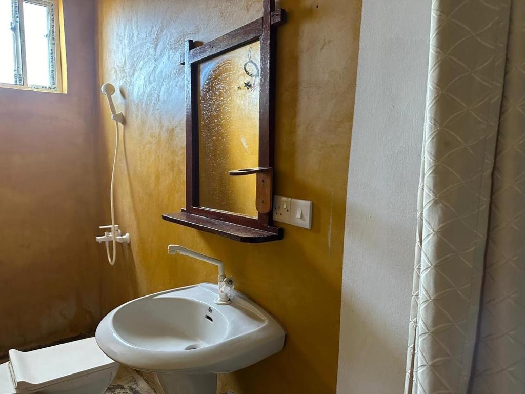 Koupelna v ubytování Mbuyuni Lodge Nungwi