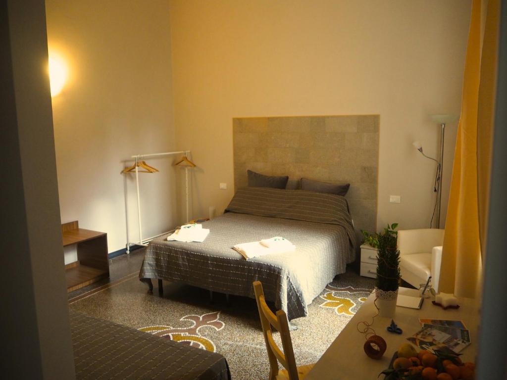 Posteľ alebo postele v izbe v ubytovaní B&B Cernaia 42