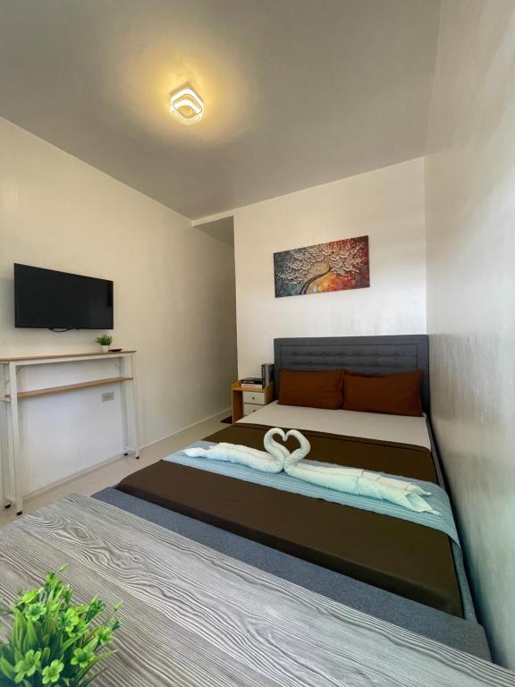Postel nebo postele na pokoji v ubytování Prim Travellers Inn