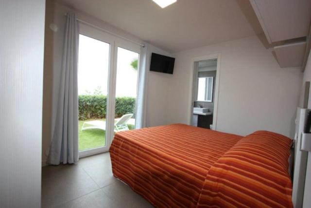 TV a/nebo společenská místnost v ubytování Holiday Center Valdor