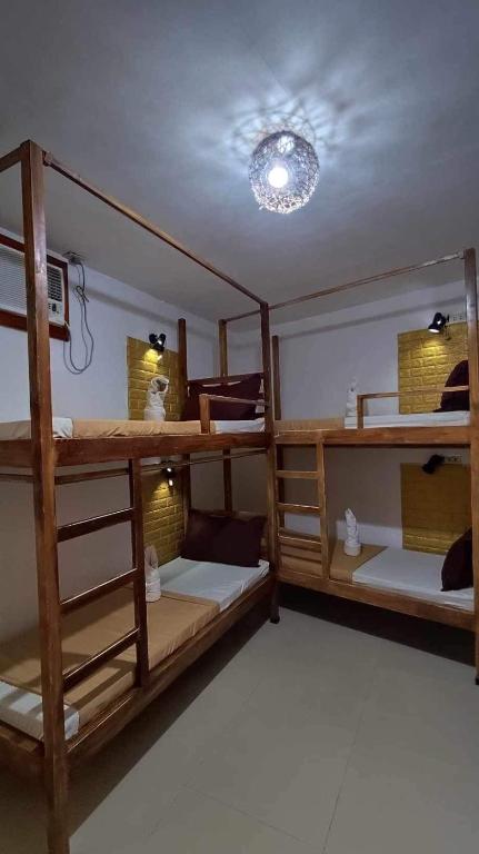 Postel nebo postele na pokoji v ubytování Prim Travellers Inn