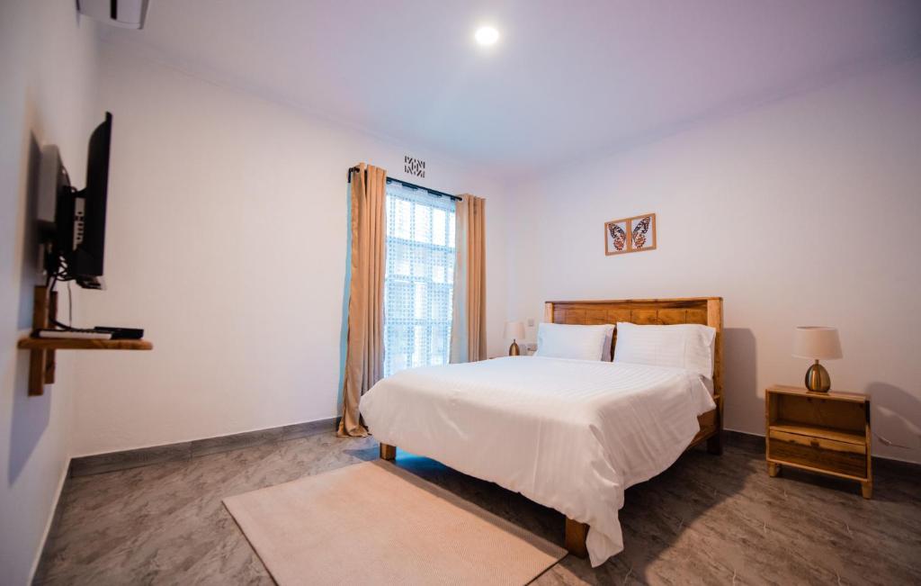 Ένα ή περισσότερα κρεβάτια σε δωμάτιο στο Katiti Lodge