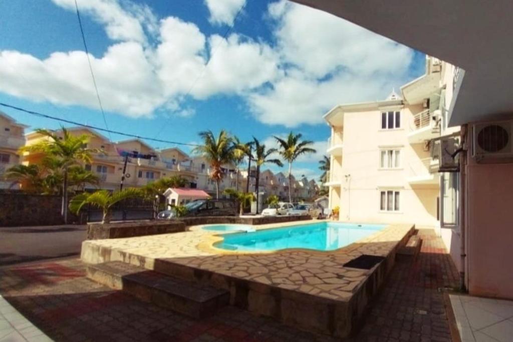 弗利康弗拉克Le Palmier 3 beds summer vacation private furnished apartment with pool near beach flic en flac的相册照片