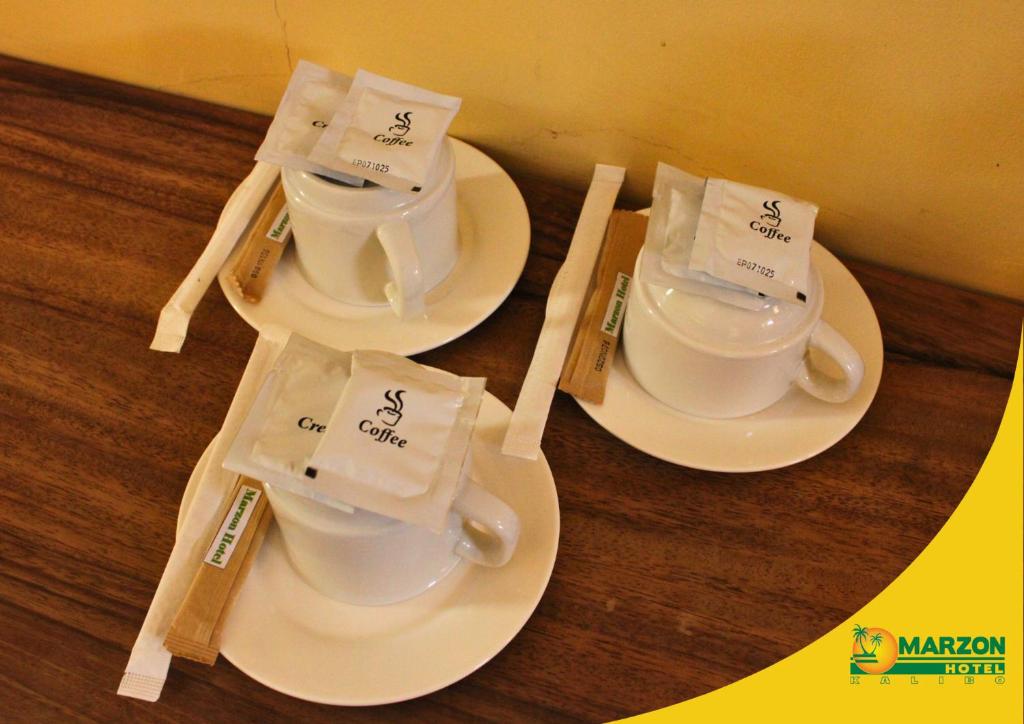 Příslušenství pro přípravu čaje a kávy v ubytování MARZON HOTEL KALIBO