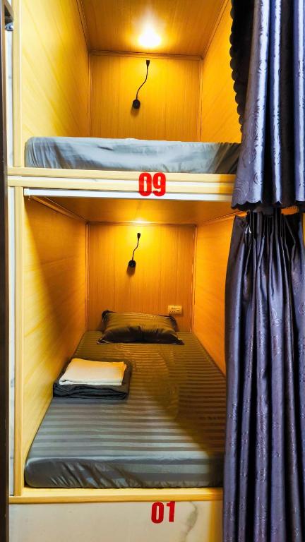 Postel nebo postele na pokoji v ubytování Sapa Garden Hostel