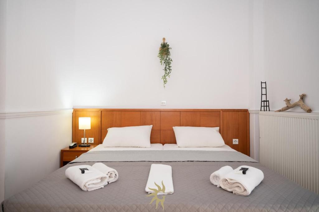 Postel nebo postele na pokoji v ubytování Galini Hotel