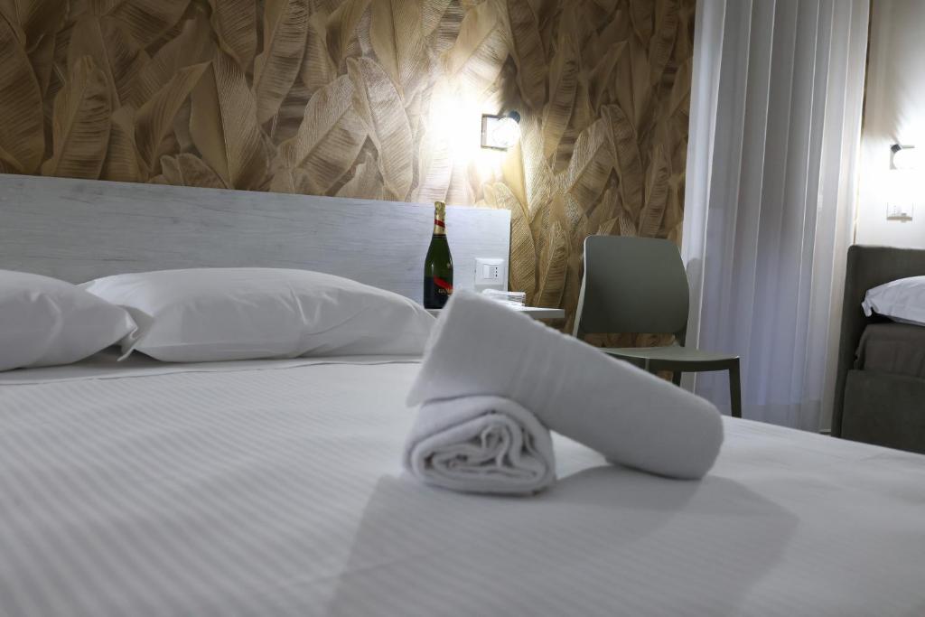 Postel nebo postele na pokoji v ubytování Bed and Breakfast 3 Medaglie