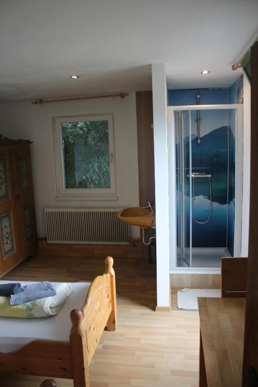 Postel nebo postele na pokoji v ubytování B&B Wolfsberg