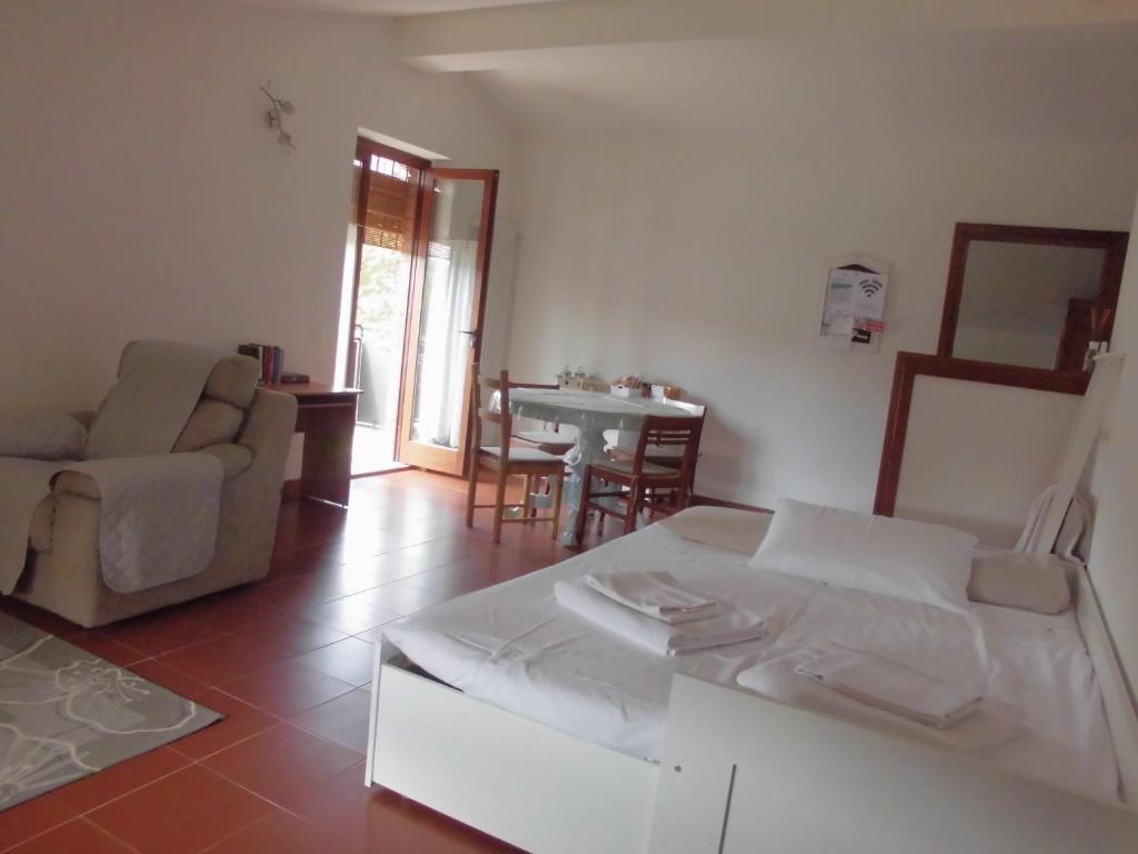 Ein Bett oder Betten in einem Zimmer der Unterkunft VILLA COLLE