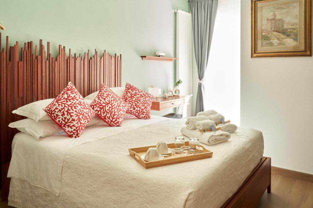 Postel nebo postele na pokoji v ubytování B&B Il Pittore del Mare