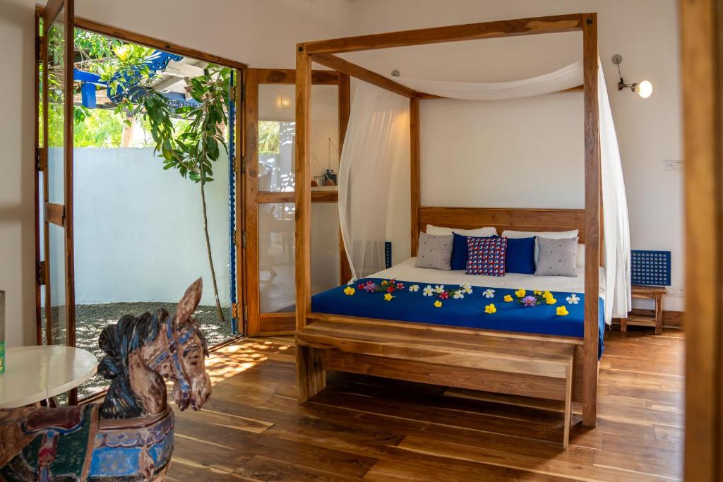 Postel nebo postele na pokoji v ubytování Amanta Beach