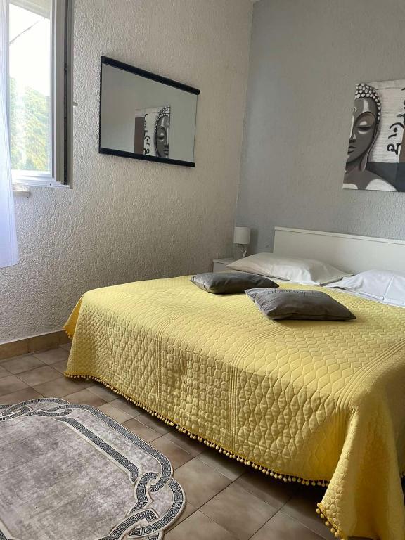 Postel nebo postele na pokoji v ubytování Apartman More