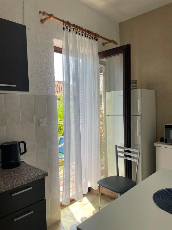 Kuchyň nebo kuchyňský kout v ubytování Apartman More